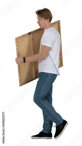 Young man carrying large wooden parcel isolated on white background