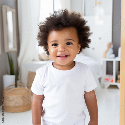 Portrait of a little child in white t-shirt. Can be used as a t-shirt mockup for your design, print or lettering.