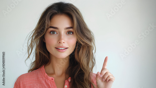 Young surprised woman pointing right with his finger