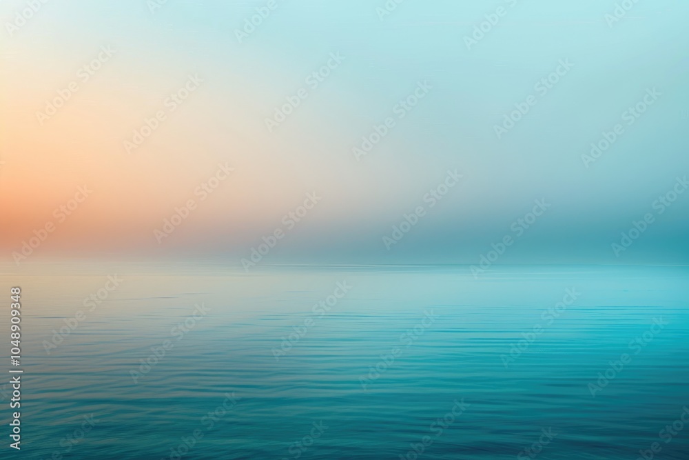Obraz premium Calm Ocean Waters at Sunset with a Gradual Color Transition