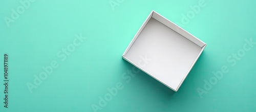 Open white gift box on a co...