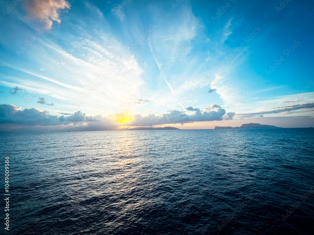 Naklejka premium ship sunrise in the ocean