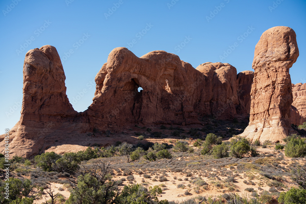 Fototapeta premium beautiful red, brown and yellow rock formations in a collection of giant natural canyons, Utah USA