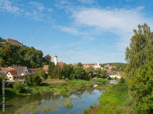 Harburg, Germany - September 29th 2023: View over the Woernitz river towards the town with the famous castle photo