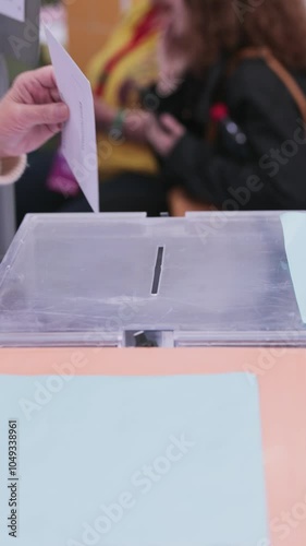 Girl close up hand on ballot box voting candidate. Unrecognizable Hispanic child. Background