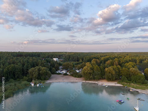 Obraz na płótnie Aerial landscape skyline view of Powidz lake and Anastazewo beach (Jezioro Powidzkie, Plaża Anastazewo) at sunset. Popular summer resort in Wielkopolska, Poland w salonie