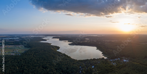 Obraz na płótnie Aerial landscape skyline view of Powidz lake and Anastazewo beach (Jezioro Powidzkie, Plaża Anastazewo) at sunset. Popular summer resort in Wielkopolska, Poland w salonie