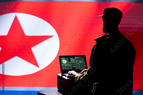 North Korea army unit responsible for air defense relaying instructions to squadrons patrolling over Korean borders. Pyongyang regime military expert uses laptop software to do ballistic tests photo