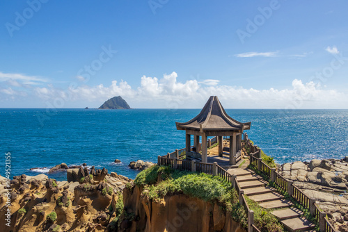 Landscape View of Spectacular Terrain Along the Seashore And Keelung Islet With Colorful view At Alabao Bay, Heping Island Park, Keelung, Taiwan photo