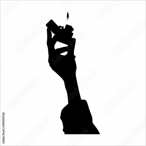 silhouette of a hand and a lighter