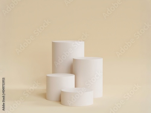 Five white cylindrical podiums of varying heights against a beige background.