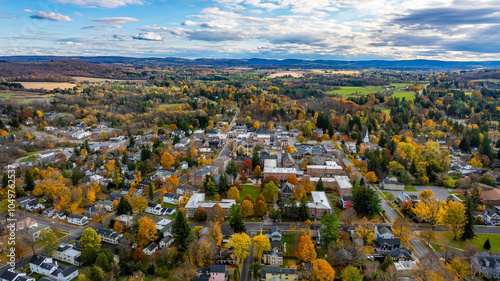 Aerial photo of fall foliage surrounding the Village of Cazenovia, Madison County, New York, October 2024.	 photo