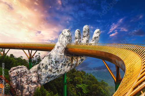 Golden Bridge at Ba Na Hills amusement Park in Da Nang in Vietnam on the mountain in summer photo