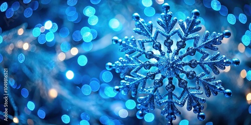 A striking blue snowflake ornament surrounded by dynamic particles, forming a captivating winter scene that enchants the eye with its hypnotic, vibrant energy. photo