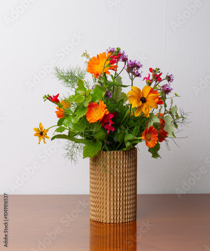 Floral arrangement with beautiful autumn flowers in a vase
