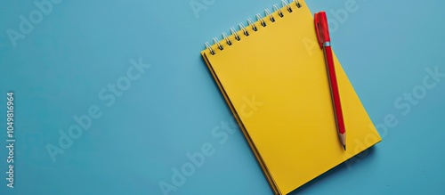 Yellow notepad and pencil f...