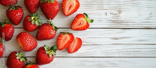 Sliced strawberries on a wh...