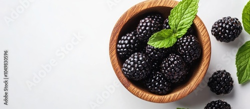 Blackberries alongside a mi...