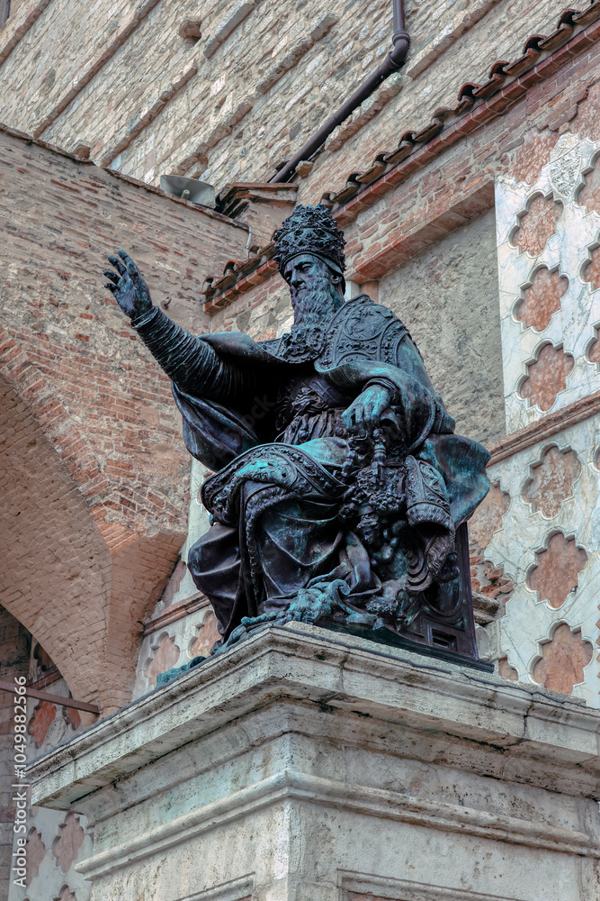 Perugia, Italy-June 26, 2024: The statue of Pope Julius III stands prominently placed in front of the Cathedral of Saint Lorenzo in Perugia, Italy.