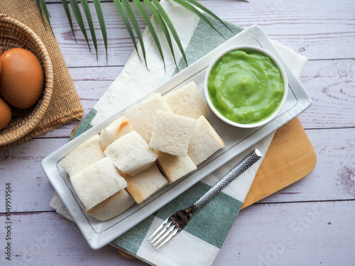 Pandan custard with steamed toast - Thai dessert called Kanom Pang Sang Kaya at top view