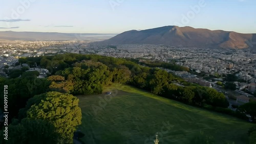 video presents aerial view Table Mountain alongside Company's Garden highlighting rich torical natural beauty photo