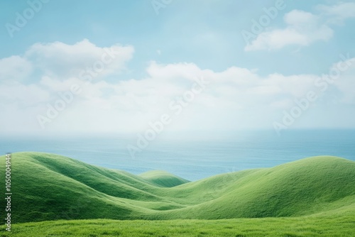 A serene scene showcasing lush green hills leading to a calm ocean, under a clear blue sky, perfect for relaxation and inspiration