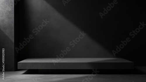 An abstract black and white background with a concrete floor and dark wall provides an empty canvas for displays or performances, enhanced by cinematic lighting that casts dramatic shadows.