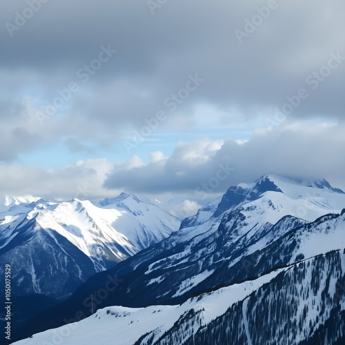 Breathtaking view of the snowy mountains under the cloudy sky