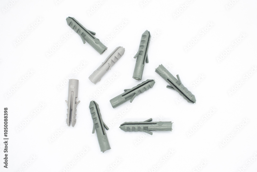 Plastic pegs isolated on white background