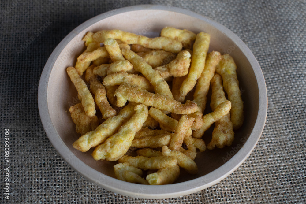 Corn chips snack in wooden bowl