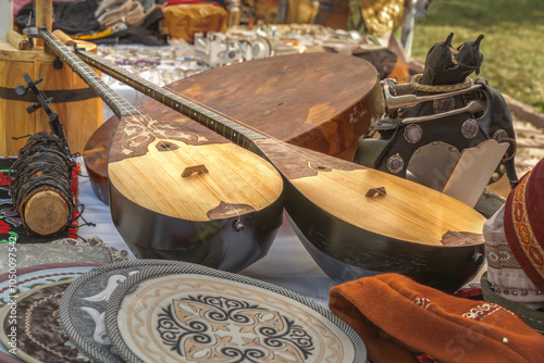 Dombra - Kazakh national musical instrument handmade with horsehair strings is sold at a street market
