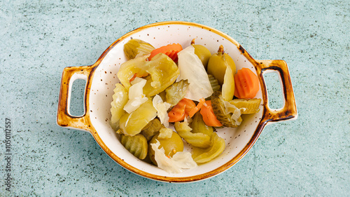 Pickled vegetables assortment in plate top view