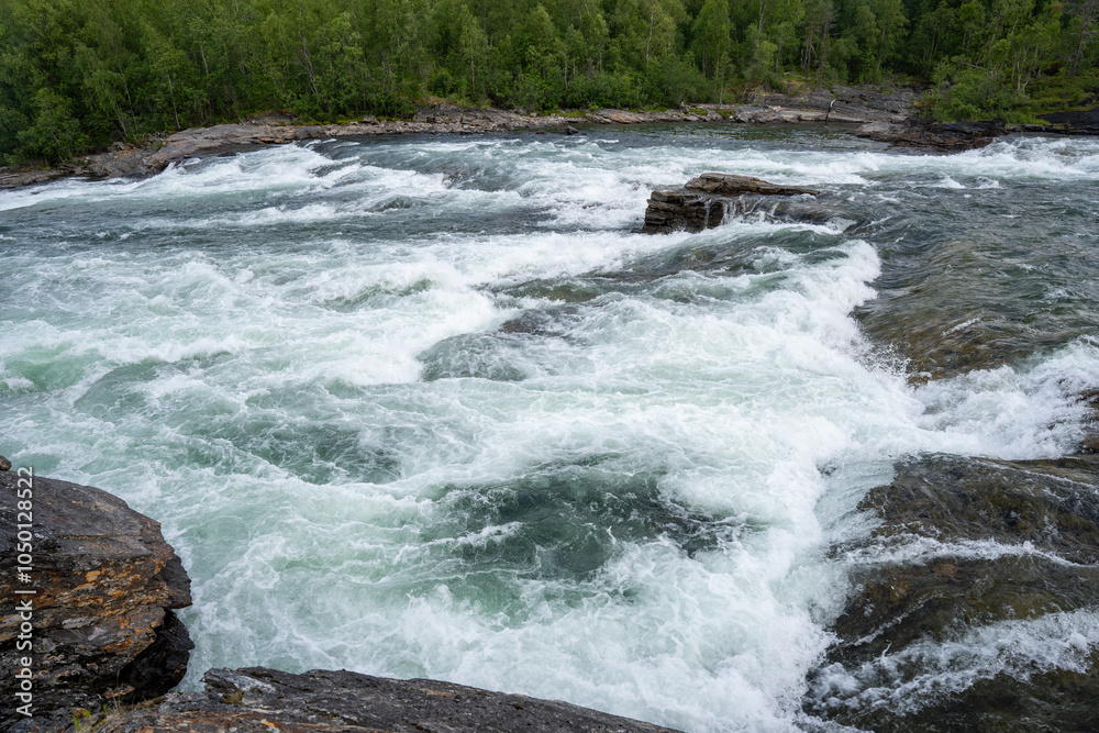 Malselvfossen waterfall in Norway in summer Malselvfossen waterfall in Norway in summer