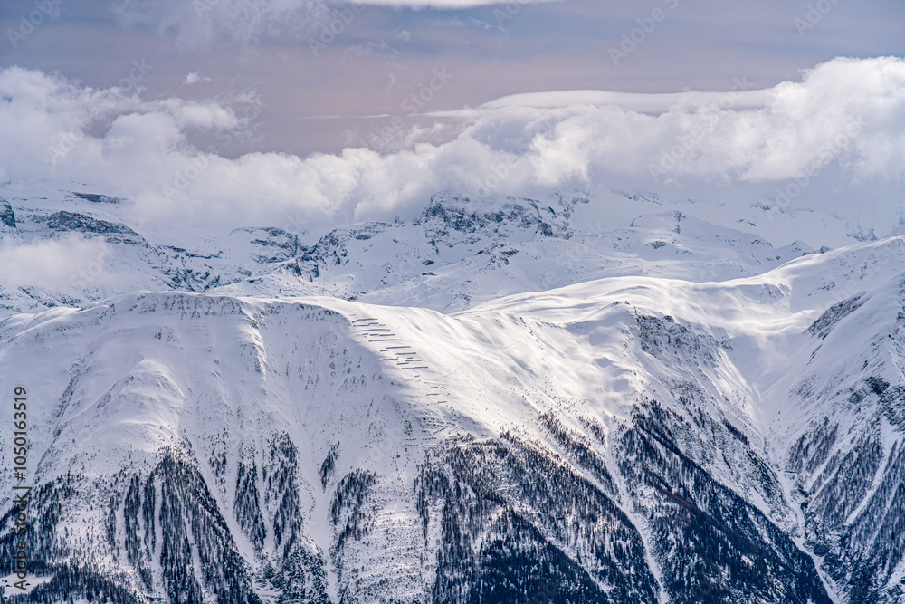 View on winter mpuntains from Eggishorn peak, Alps.