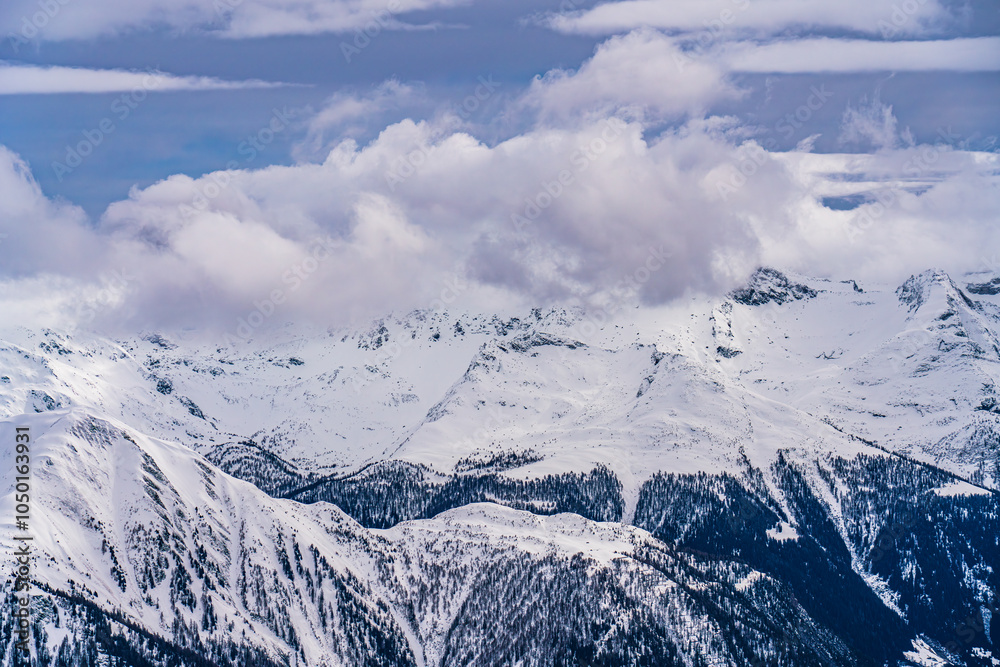 View on winter mpuntains from Eggishorn peak, Alps.