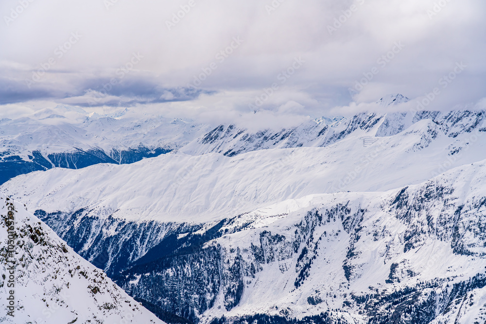 View on winter mpuntains from Eggishorn peak, Alps.