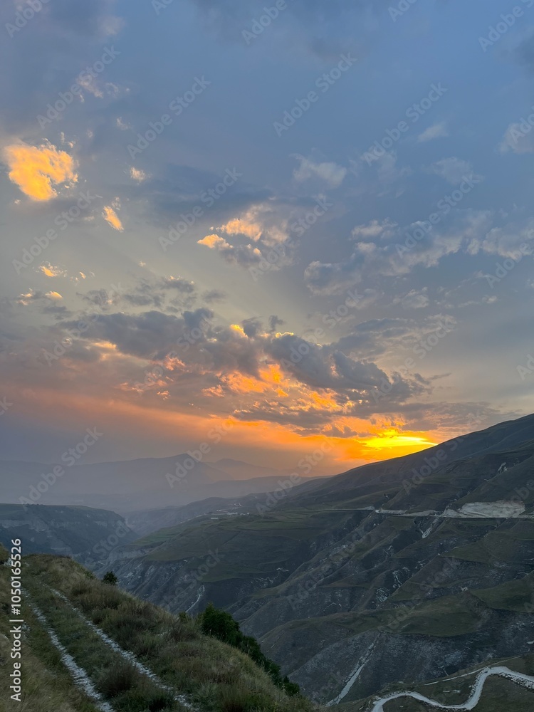 Naklejka premium sunset in the mountains