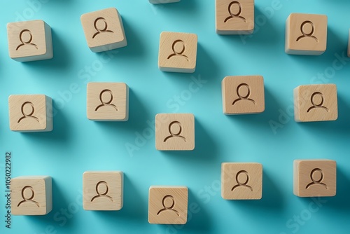 Wooden Blocks with Person Icons - Social Connection Pattern on Blue Background