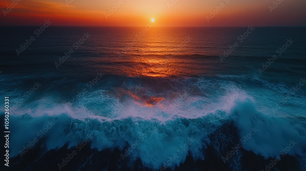 Fototapeta premium Serene Sunset Over Ocean Waves