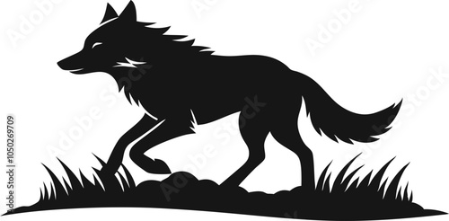 Vector silhouette of a Mackenzie Valley Wolf running animal design