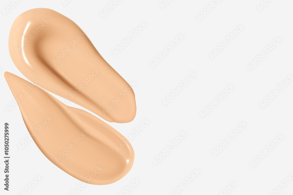 Composition of foundation cream smears on a light background. Makeup product, beauty textures. Composition of foundation cream smears on a light background. Makeup product, beauty textures.