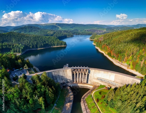 aerial panoramic view of stone dam at reservoir near karkonosze mountains dam and hydroelectric water power station concept of the clean energy drone shot at pilchowice lake poland
