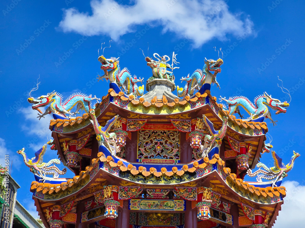 Close-Up of Taiwanese Temple Roof with Dragons and God Statues. Close-Up of Taiwanese Temple Roof with Dragons and God Statues.