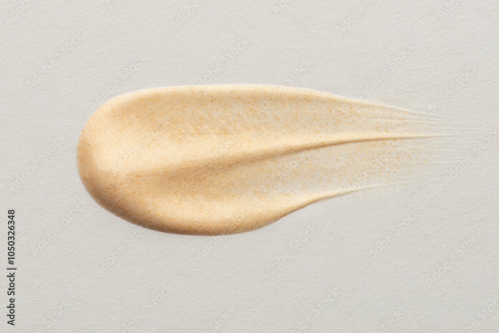 Obraz premium Smears with foundation texture on white isolated background
