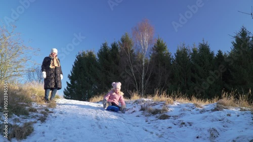 Kids bobsledding