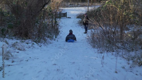 Kids bobsledding