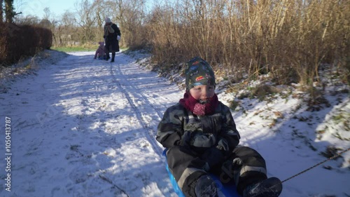 Kids bobsledding