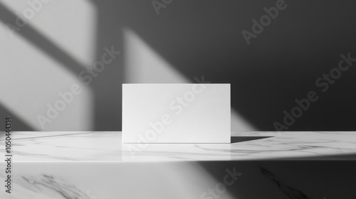 Wallpaper Mural A pristine business card rests on marble, highlighted by soft side lighting Torontodigital.ca