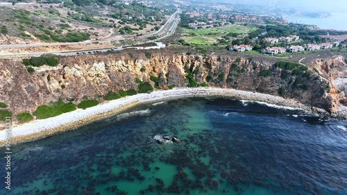 Aerial Over Gorgeous Abalone Bay with View of Stunning Rocks, Cliffs, On a Point