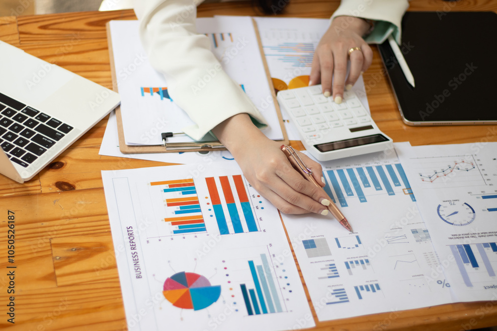 © SAISUPAWKA - close up of a person working on a document